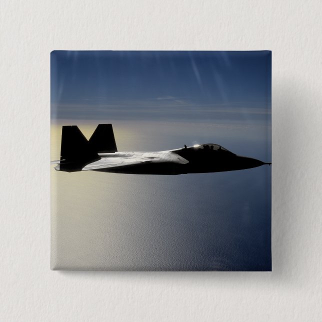 En F/A-22 Raptor flyger med en träning uppdrag 2 Knapp (Framsida)