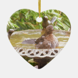 En fågel i badet julgransprydnad keramik