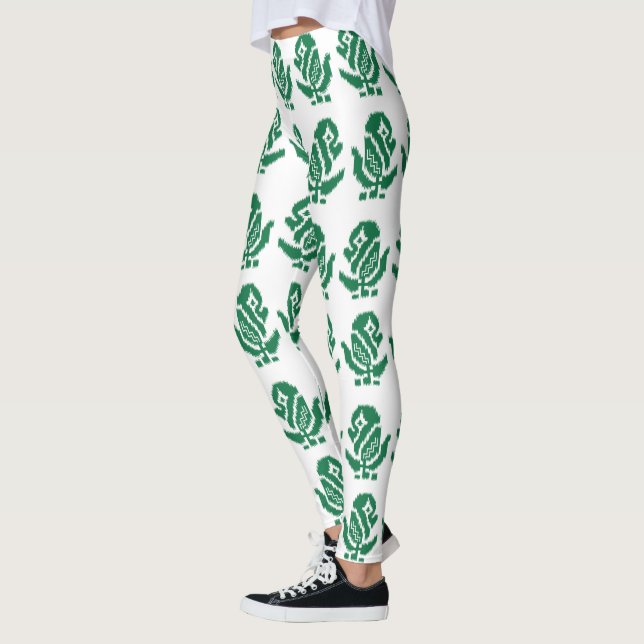 En fängslande grönt och svart design med fetstil leggings (Vänster)