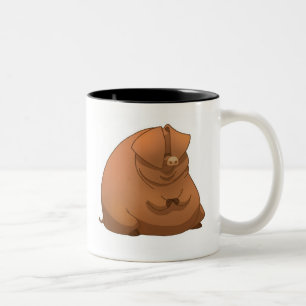 En fet gris på en mugg
