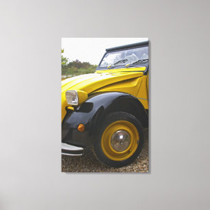 En gammal svart och gul Citroen 2CV 2 CV, Canvastryck