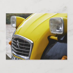 En gammal svart och gul Citroen 2CV 2 CV, detalj Vykort