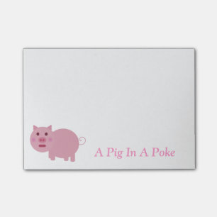 En gris i en peta postar den noterar post-it block