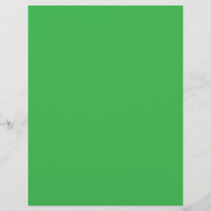 en grönt med vit gräns reklamblad