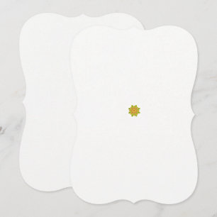 en grönt och en röd blomma med svarta punkter