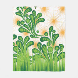 En grönt och guld som skildrar ett träd fleecefilt