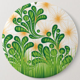 En grönt och guld som skildrar ett träd knapp