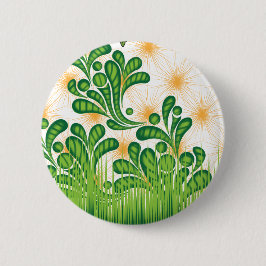 En grönt och guld som skildrar ett träd knapp