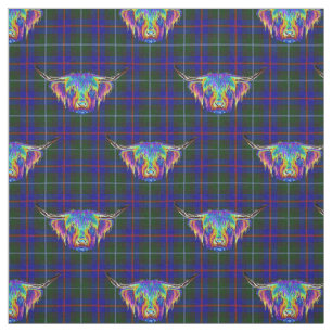 En härlig färgglad höglands- ko på tartan.en tyg