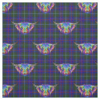 En härlig färgglad höglands- ko på tartan.en tyg