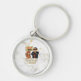 En humoristisk bild tecknad-stil rund silverfärgad nyckelring