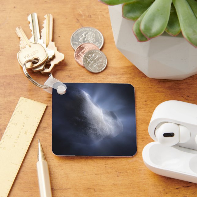 En illustrativ avslutning av Comet Tempel. Nyckelring (Skrivbord)