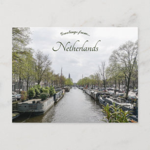En kanal i Amsterdam Nederländerna Vykort