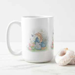 En kaninmamma med en babykanin på en öppen plats kaffemugg
