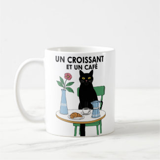 En katt croissant  kaffemugg