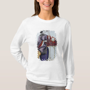 En kinesisk kvinna som ordnar henne hår t shirt
