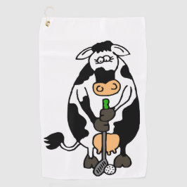 En ko som spelar golf