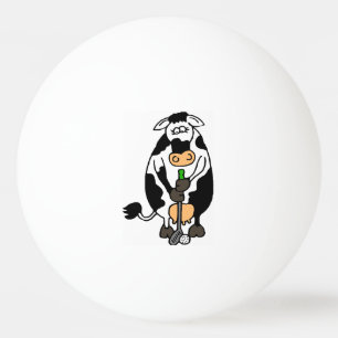 En ko som spelar golf pingisboll