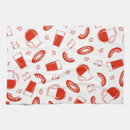 En kökshandduk med en ljus, glad utskrift.