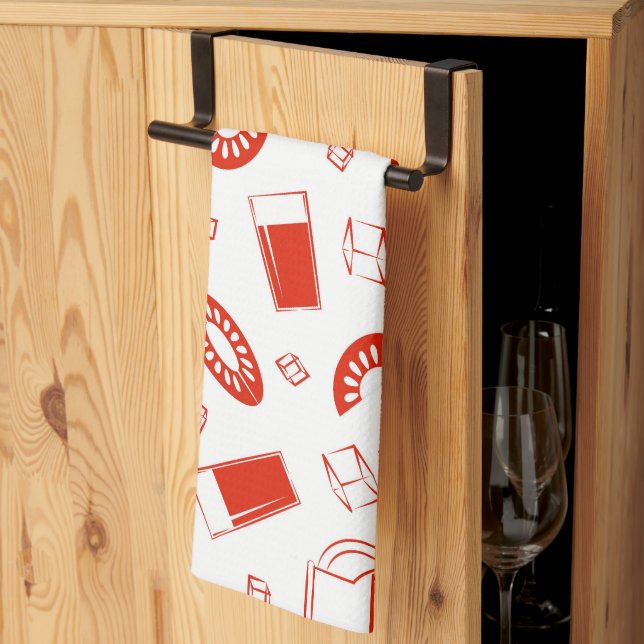 En kökshandduk med en ljus, glad utskrift. (Thirds Fold)