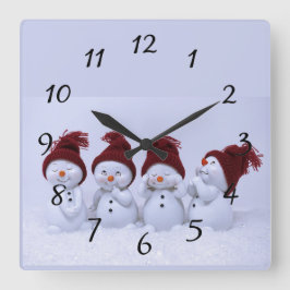 En kvartett snögubbar fyrkantig klocka