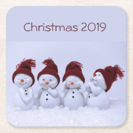 En kvartett snögubbar underlägg papper kvadrat