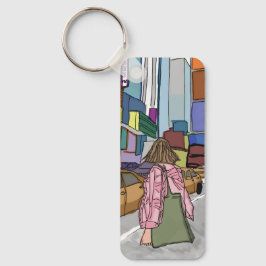 En kvinna går ner på en bustig stadsgata. nyckelring