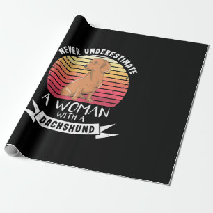 En kvinna med doachshund presentpapper