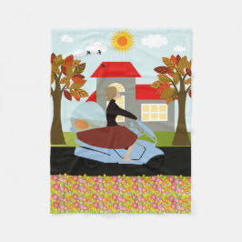 En kvinna på motorcykel fleecefilt