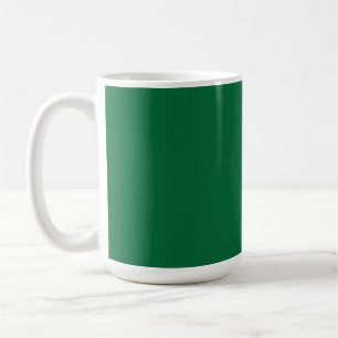 En levande grönt löv med distinkta ventiler är ill kaffemugg