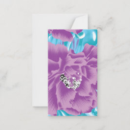 En levande textildesign med lila och turk anteckningskort