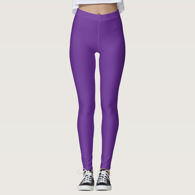 en lila bakgrund med leggings (Framsida)