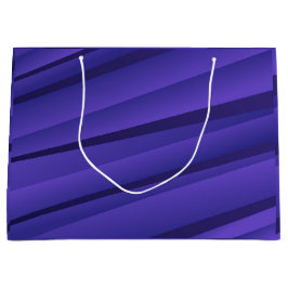 En lila presentbag med ett vågigt, abstrakt mönste