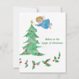 En liten ängel ger julgranen julkort