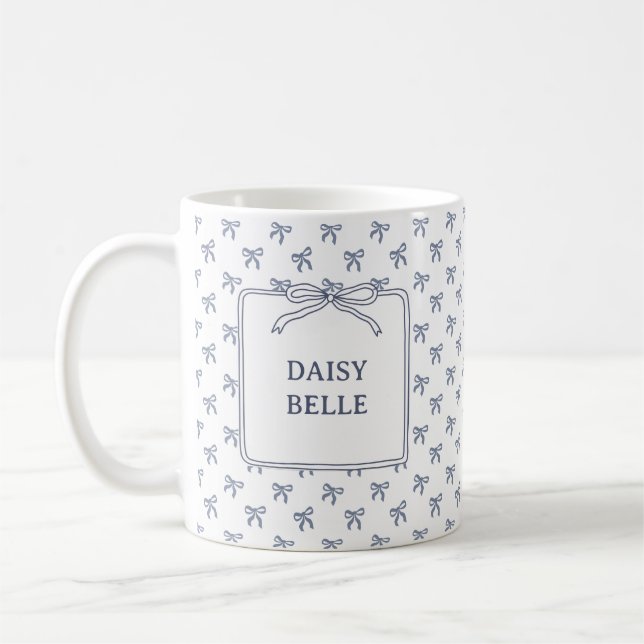 En liten blå jeanbaby blå kokettbåge kaffemugg (Vänster)