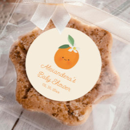 En liten citrusbabystövel i Cutie Runt Klistermärke