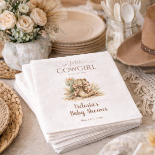 En liten cowgirl western tema baby shower pappersservett