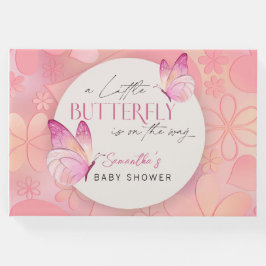 En liten fjäril är på vägen till babyduschen gästböcker