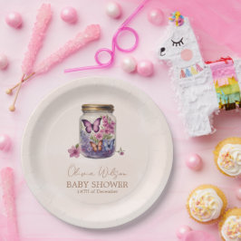 En liten fjäril i en babydusch i blommigten burk