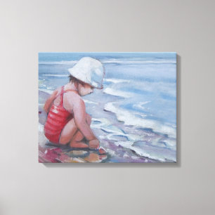 En liten flicka med vit hatt på stranden canvastryck