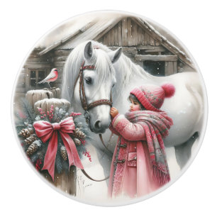 En liten flicka och hennes vita häst knopp