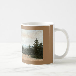 En liten grupp gräs i ett litet fält kaffemugg