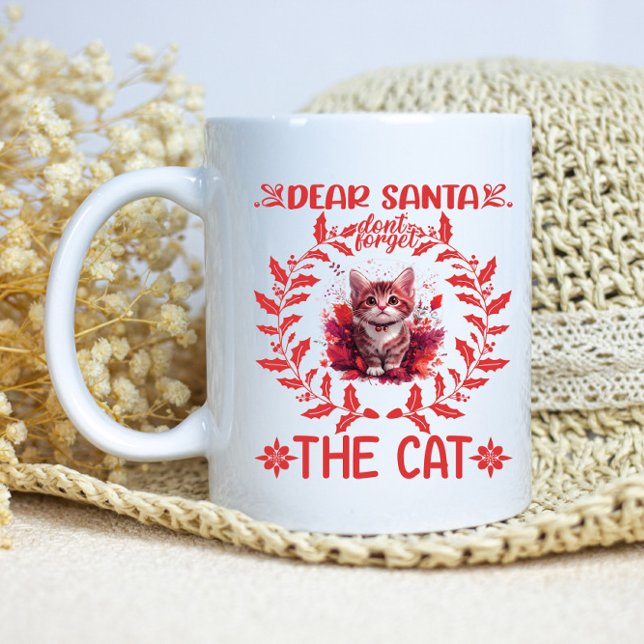 En liten helgdag från en lekfull kattunge kaffemugg (Skapare uppladdad)