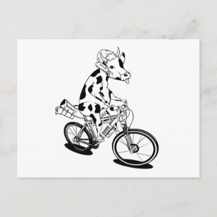En lustig ko som cyklar vykort