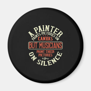 En målarfärg målar Bilder på arbetsytan. Magnet