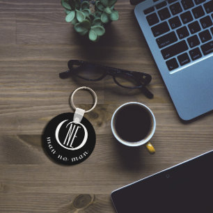 En man ingen man uppmuntran citat svart nyckelring