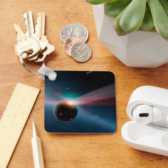 En mängd kometer i ETTA-korvi-systemet. Nyckelring (Skrivbord)