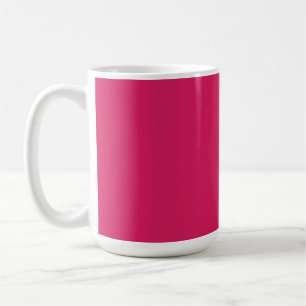 En mängd rödblommor och rosa med lush grönt l kaffemugg