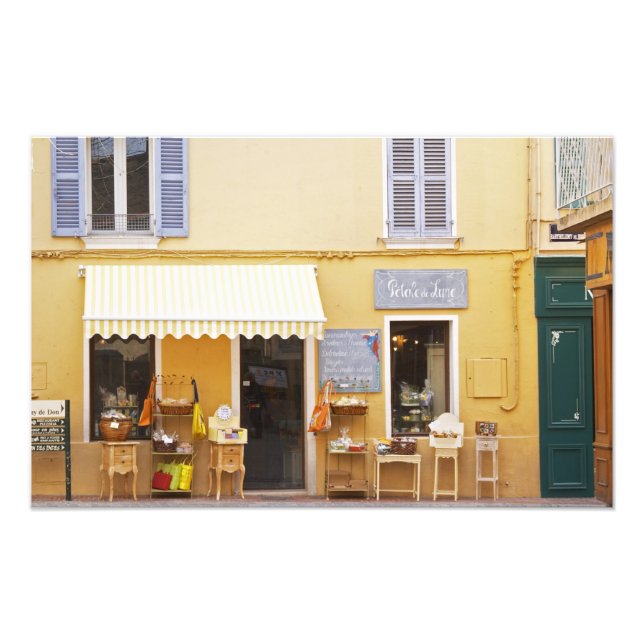 En marknadsplats i den gamla staden med en butik fototryck (Framsidan)