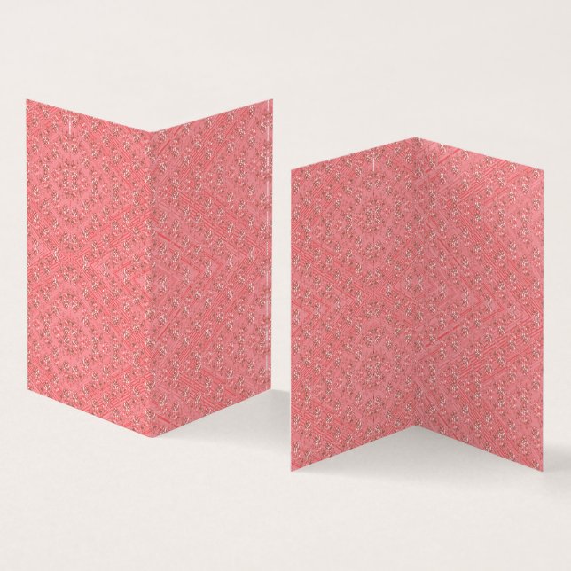 En matta med rött motiv och rosa har en dekorat kort (In- och utsida)